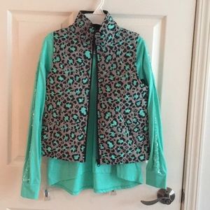 A vest and a blue shirt combined